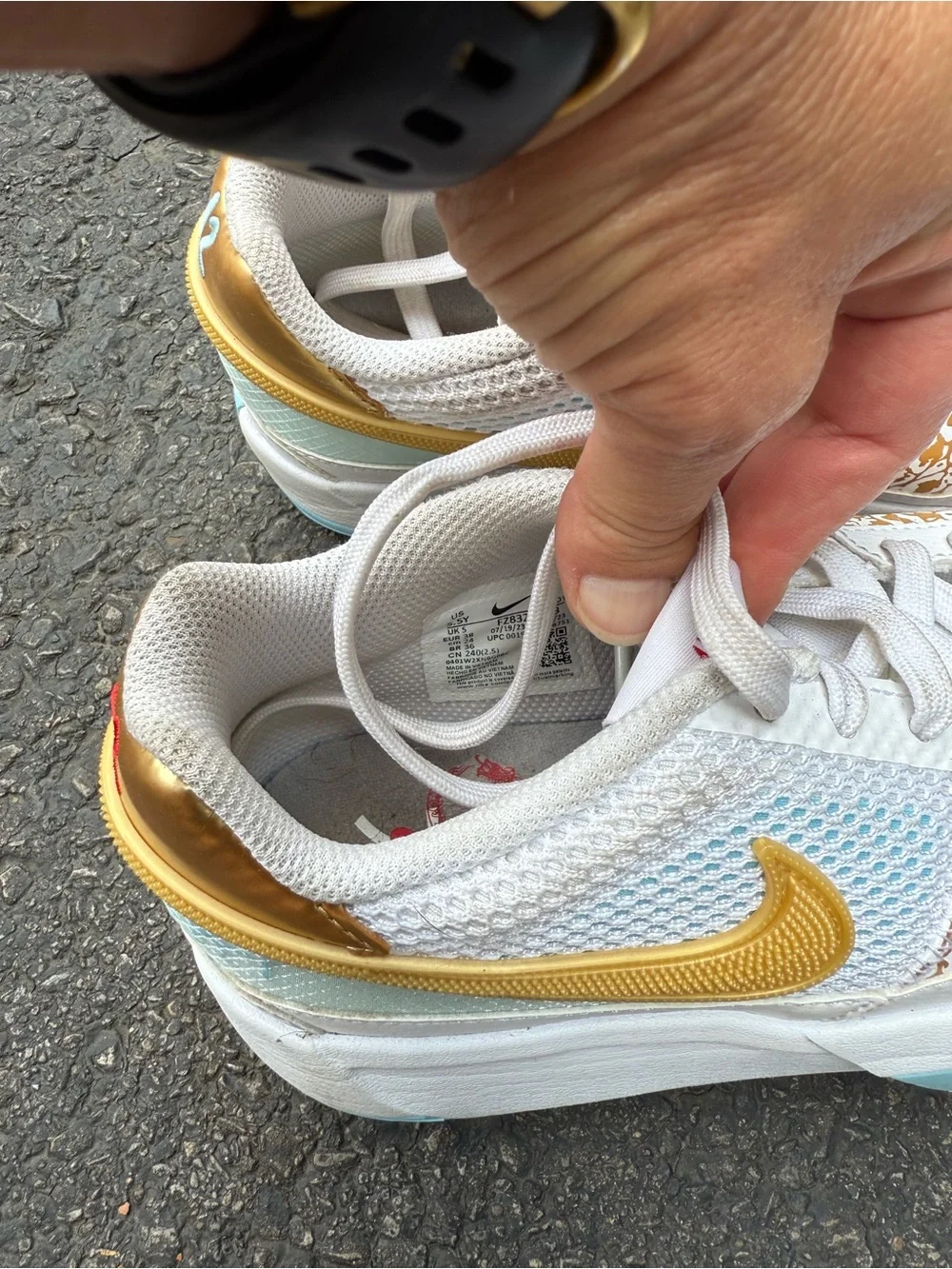 Nike Kids JA White Sneakers with Gold Swoosh